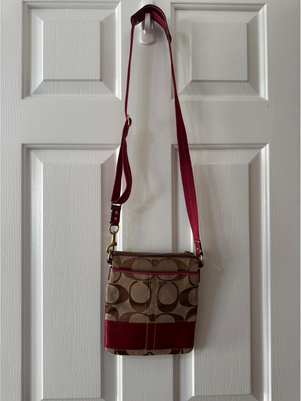C38. Coach Signature Canvas Crossbody Bag